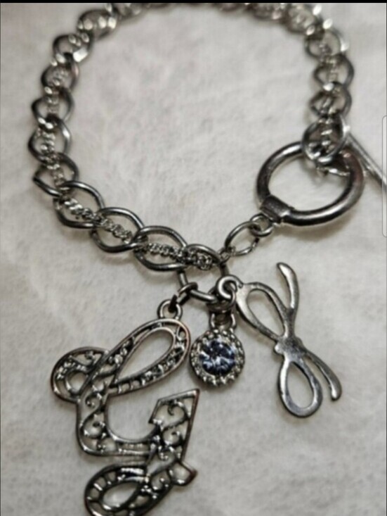 G by Guess Jewelry - G by Guess 80's Silver-Tone Charm Bracelet with 'G' Initial Bow & Crystal Accent